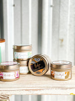 Candle in a tin by Little Black Duck